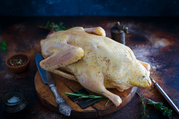 istock Raw fresh homemade indow duck on wooden board, selective focus 1296090731