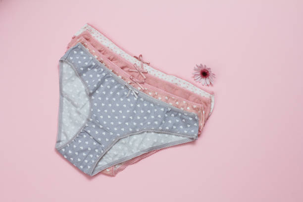 istock Beautiful women's cotton panties on pink background. 1296090973