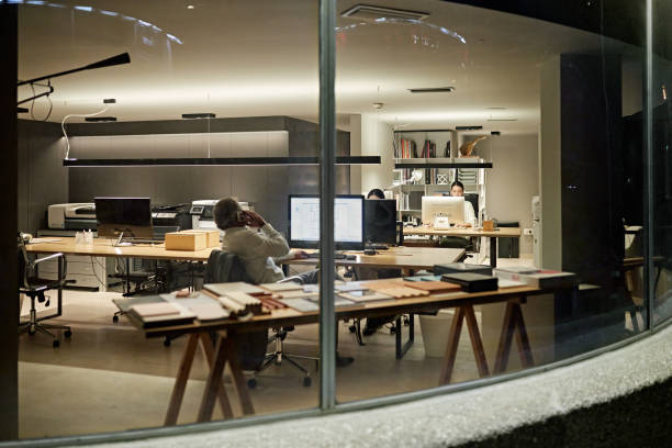 istock Exterior View of Design Professionals Working Late 1296093753