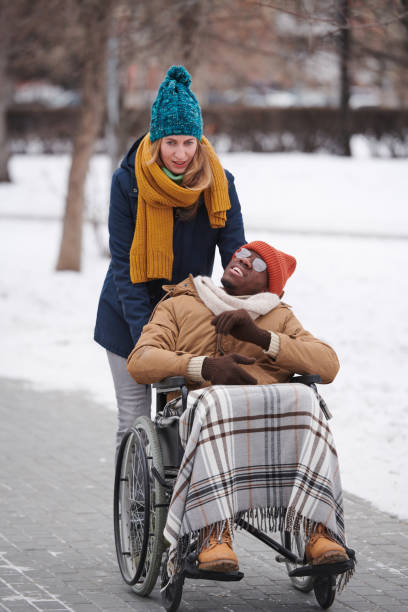 istock Disabled man walking outdoors 1296098983