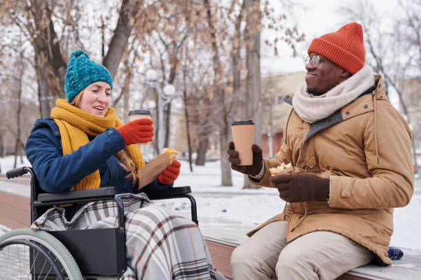 Couple drinking tea outdoors
