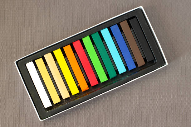 Bright crayons, multicolored art pastel close-up, selected focus top view