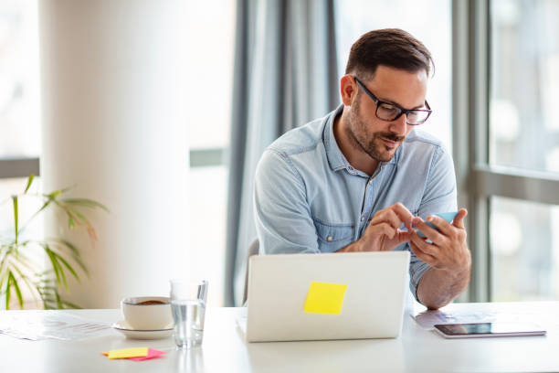 istock Young businessman working on laptop. 1296101417