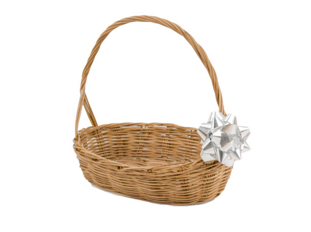 Empty wicker basket with ribbon isolated on white and clipping path
