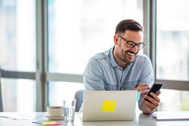 istock Young businessman working on laptop 1296103973