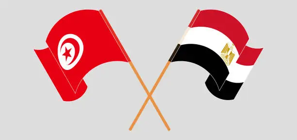 Vector illustration of Crossed and waving flags of Egypt and Tunisia