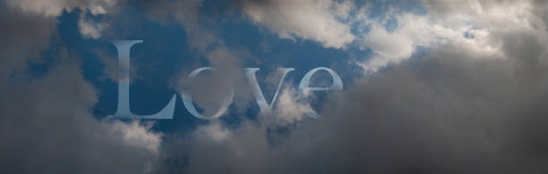 istock Love amongst clouds. Symbolic word written on the sky. 1296108062