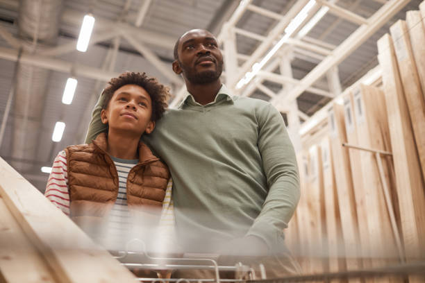 Father and Son Buying Construction Materials