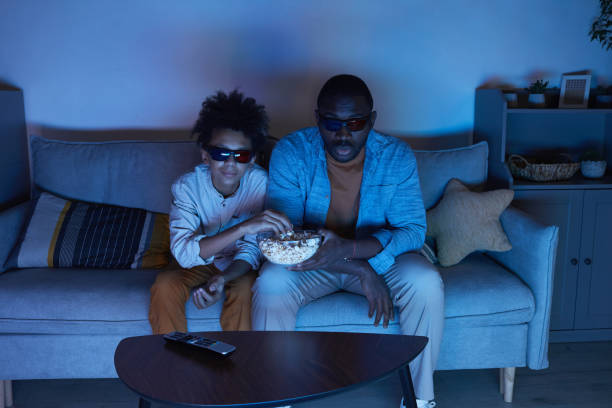 istock Watching Movie At Home 1296112894