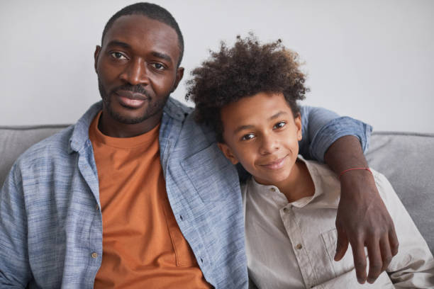 istock Proud Father with Teen Son 1296112927