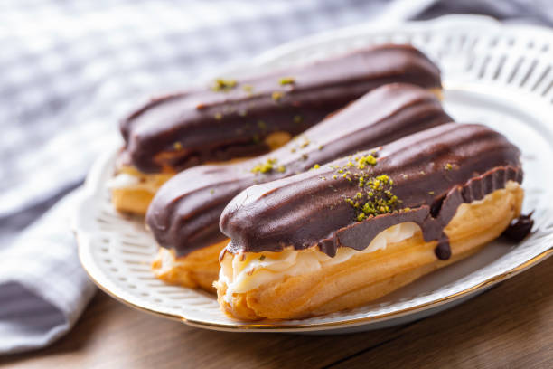 istock Traditional french eclairs with chocolate. 1296112992