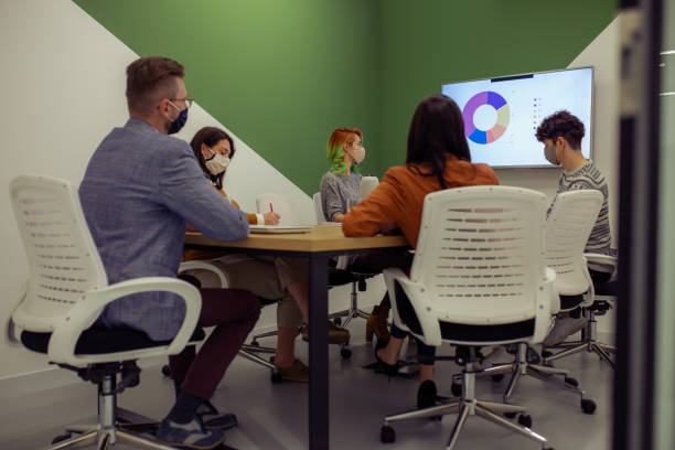 istock Business Team Having A Meeting In Board Room 1296116041