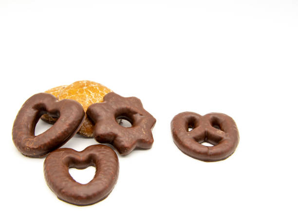 istock Several gingerbread cookies are placed on a white background. 1296119664