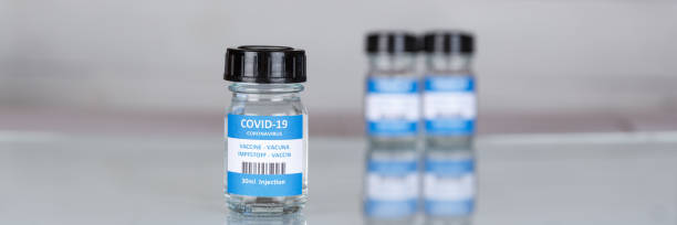 istock Coronavirus Vaccine bottle Corona Virus COVID-19 Covid vaccines copyspace copy space panoramic photo 1296121191