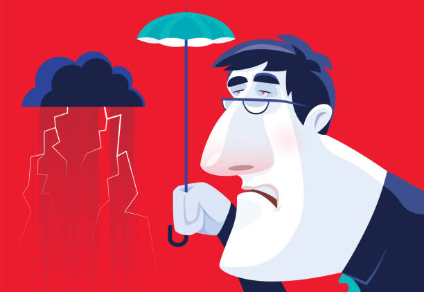 istock sad businessman holding small umbrella and meeting black cloud 1296121711