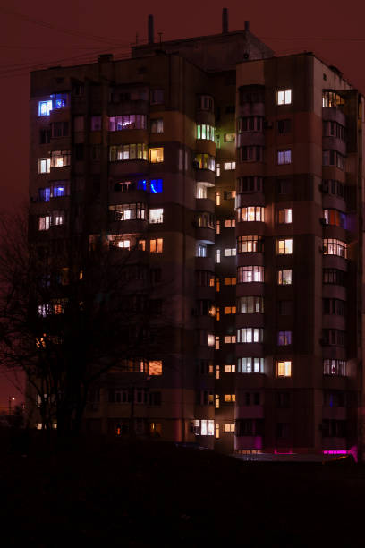 istock Cityscape, City apartments at night. 1296122633