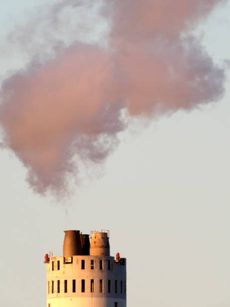 istock Smoke emission illuminated by the sunset 1296122754