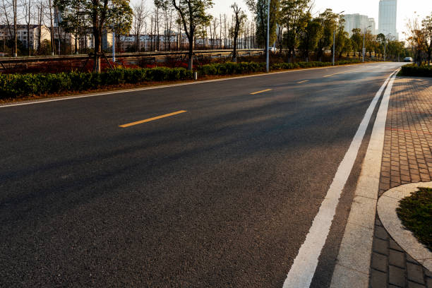 istock Empty urban road and buildings in China 1296125820