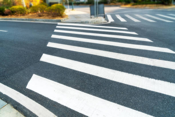 istock Zebra crossing on outdoor road 1296125831