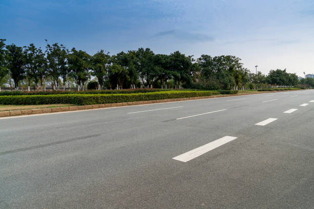 istock Empty urban road and buildings in China 1296125869