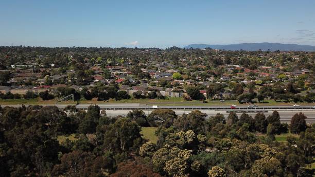 istock Aerial road and city scape 1296125925