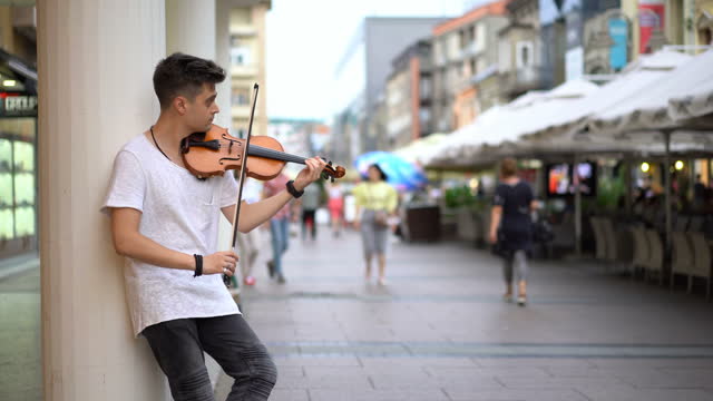 Busker playing violin