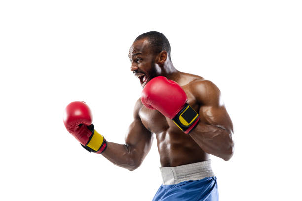 istock Bright emotions of professional boxer isolated on white studio background, excitement in game 1296128612