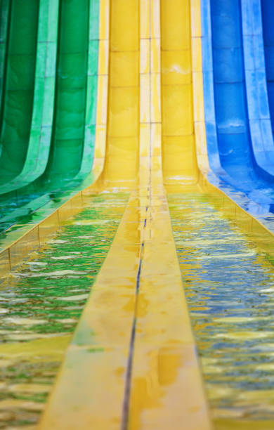 istock water slides in tropical waterpark on a sunny day 1296128922