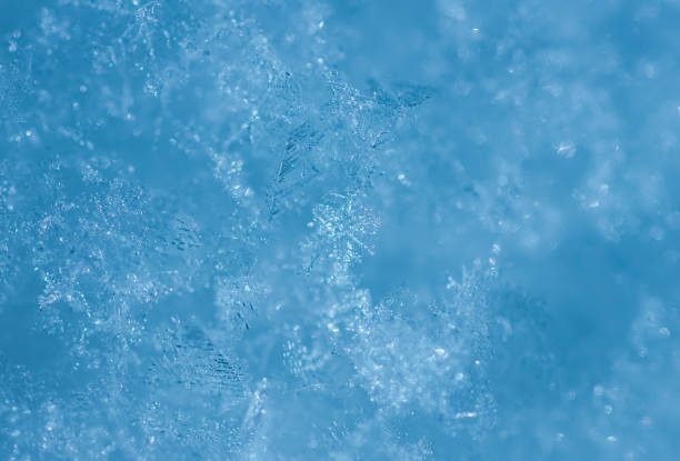 istock christmas blue snow, winter background 1296130836