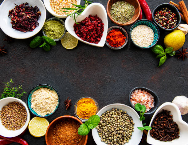 istock Various spices in a bowls on a black 1296130993