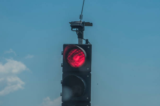 istock red traffic light on the street 1296132056