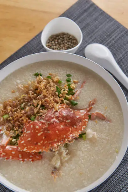 Photo of Whole crab porridge served with peppers Popular dishes in Thailand