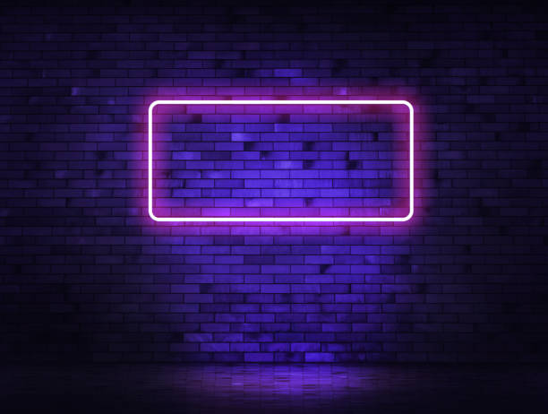 istock Brick  neon wall with tube and wet asphalt. Background with copy space 1296135640