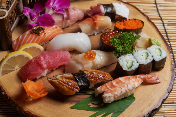 istock Includes sashimi menu Fresh salmon and tuna Sushi and squid Popular dishes in Japan 1296135849