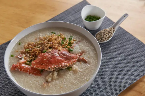 Photo of Whole crab porridge served with peppers Popular dishes in Thailand