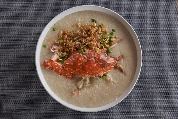 Photo of Whole crab porridge served with peppers Popular dishes in Thailand