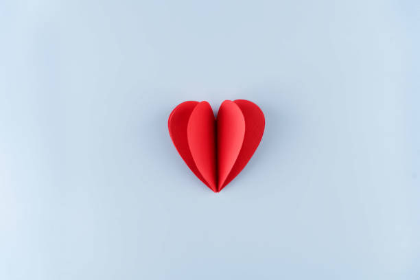 istock Gray background with red pepper hearts for Valentine's day 1296136386