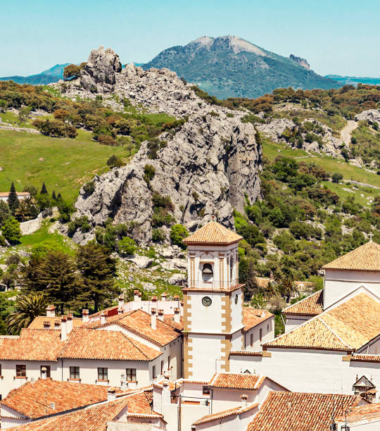 Tower bell White houses of Grazalema surrounded by mountains in Spain grazalema stock pictures, royalty-free photos & images