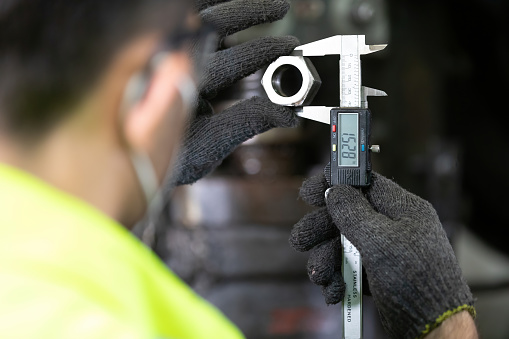 Worker Using Calipers Closeup Behind Engineer Man Or Factory Worker Using Calipers Measures ...