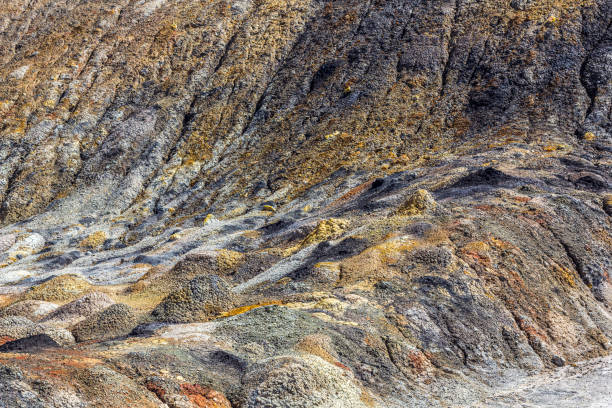 istock Landscape like a planet Mars surface. Ural refractory clay quarries. Nature of Ural mountains, Russia. Solidified red-brown black Earth surface for screensaver for desktop, banner, cover. 1296149028