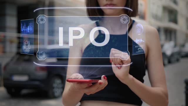 Young adult interacts hologram IPO