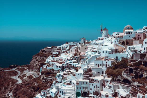 istock Cascading Downhill Village In Santorini, Greece 1296151093