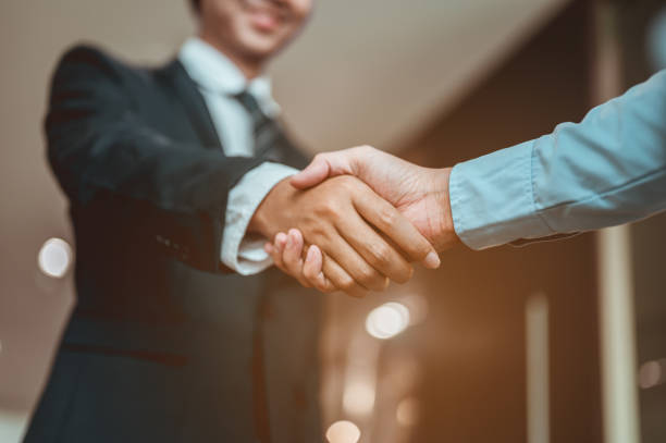istock Businessman shake hands and get to know each other before they start talking about business.Bussiness,working, success concept 1296151210