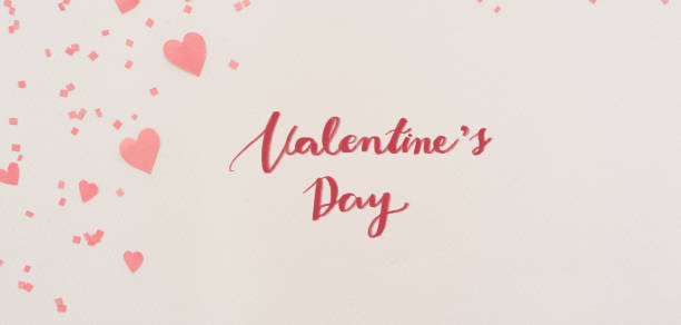 istock close up on white color background with pastel colorful heart shape and confetti with valentine's day calligraphy message concept 1296151373