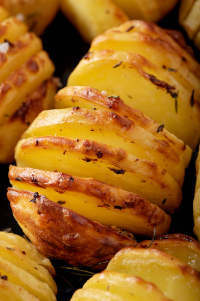 istock Hasselback Potatoes or Hasselback Kartofler 1296151755