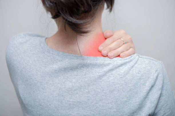 istock Woman Having Neck Pain 1296152501