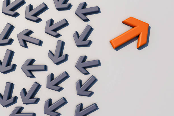 istock Orange arrow coming out from the advancing grey arrows 1296154969