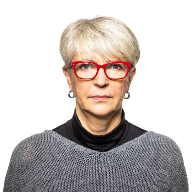 istock Senior woman looking confidently at camera 1296155641