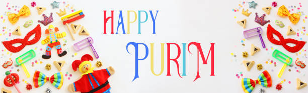 istock Purim celebration concept (jewish carnival holiday) over wooden white background. Top view, flat lay 1296156600