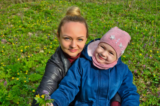 istock The family is walking in the spring forest. 1296157614